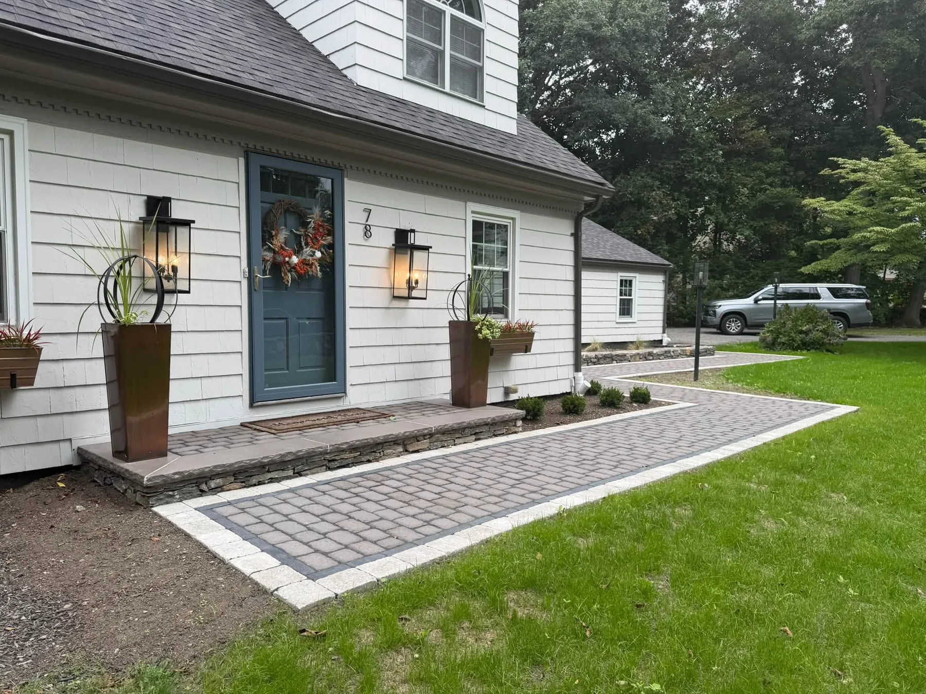 Crafted paver walkway at New England home
